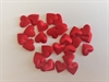 Ca. 24 stk. røde let buede   stof mini hjerter. Ca. 1,2 cm.